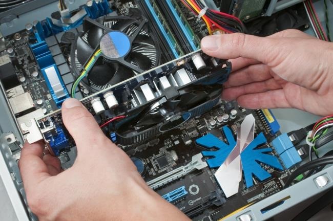 inserting a graphics card into the asus motherboard